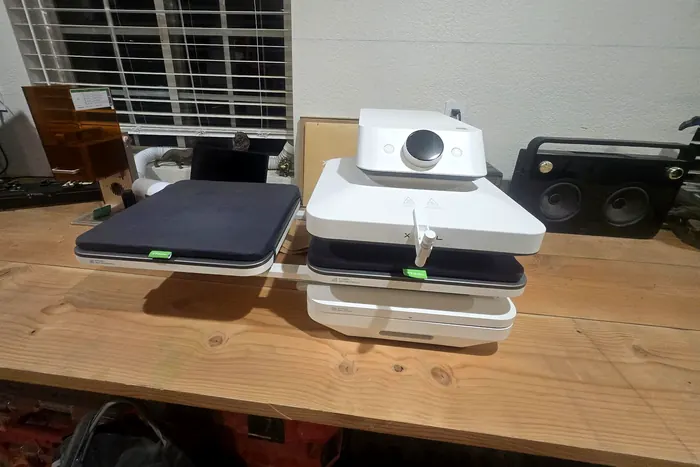Heat press and laser equipment in the apparel shop